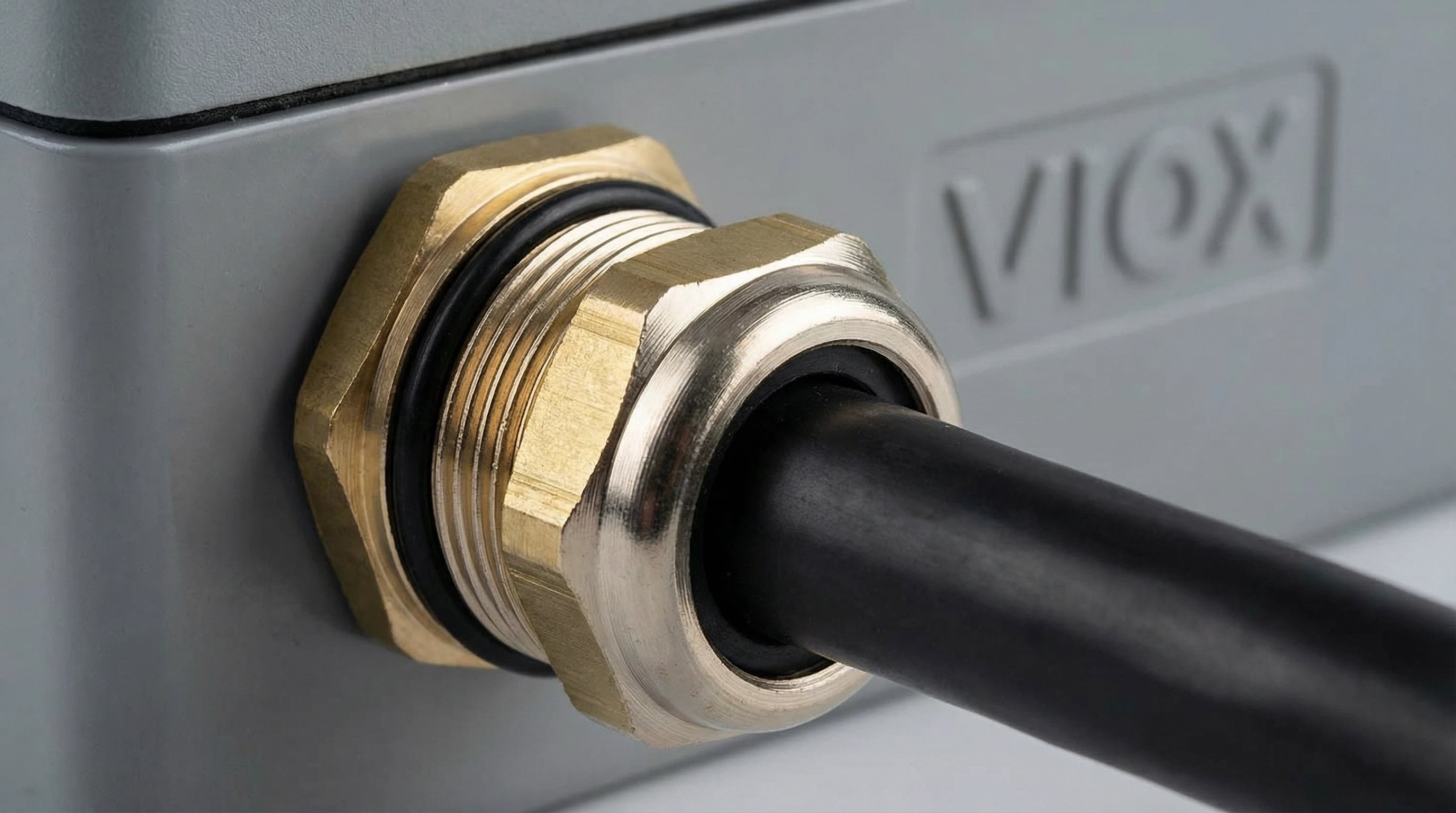 Close-up of IP68 cable gland installation